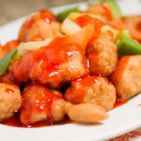 Sweet & Sour Chicken · Deep fried breaded chicken with onion, bell pepper, carrot and pineapple in sweet and sour s...