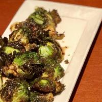 Brussels Sprouts Frite · spiced cashews, lemon, honey     350 cal.