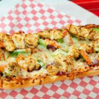 Grilled Chicken Sub · Can-Am marinated chicken, onions, green peppers, tomatoes, pizza sauce and mozzarella