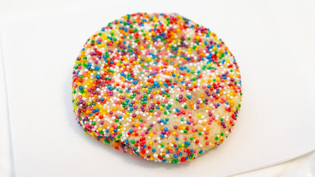 Birthday Cake · Our soft birthday cake cookie is more than just a sugar cookie. It contains almond extract, white chocolate chips, and crunchy sprinkles on top!