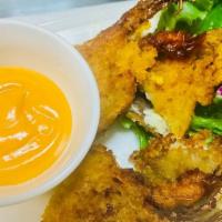 A10- Soft Shell Crab · Breaded soft-shell crab deep fried and served with house creamy sriracha sauce
