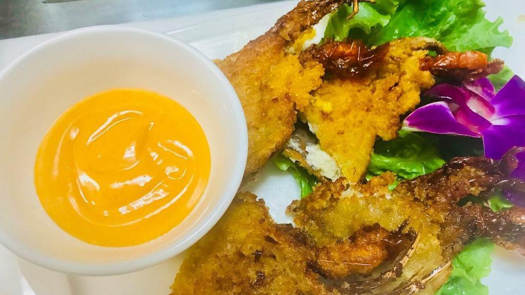 A10- Soft Shell Crab · Breaded soft-shell crab deep fried and served with house creamy sriracha sauce