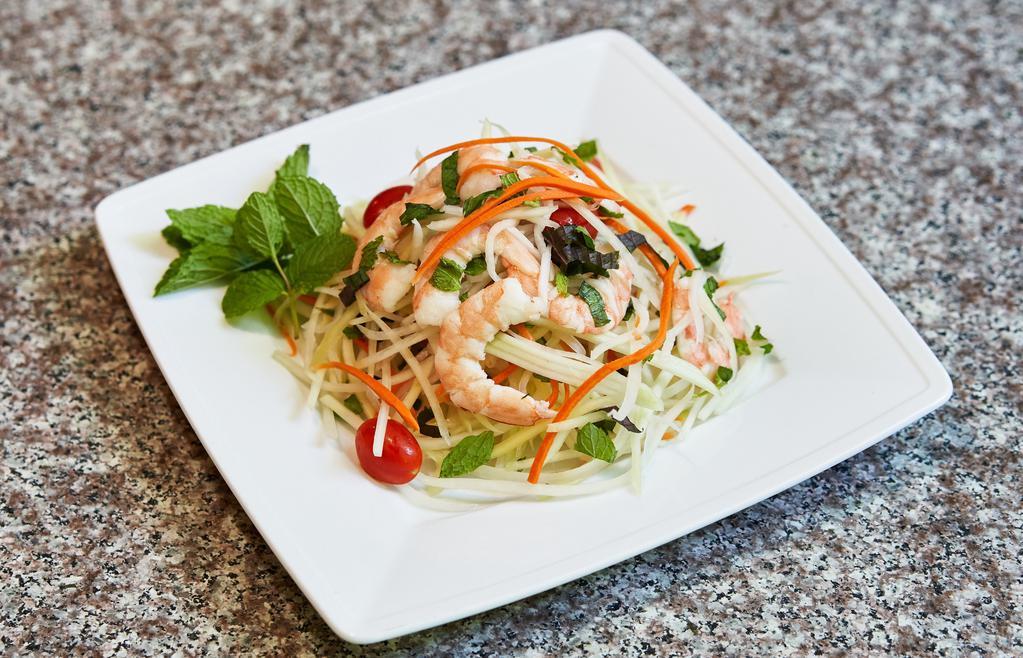 Papaya Salad · Shredded young green papaya, grape tomato and shrimp tossed in spicy house fish sauce topped with mint, peanut and shallots