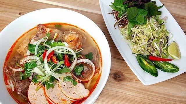 Bún Bò Huế / Spicy Beef Noodle Soup · Spicy beef noodle with round rice noodle, beef brisket and shank, tendon and pork saussage