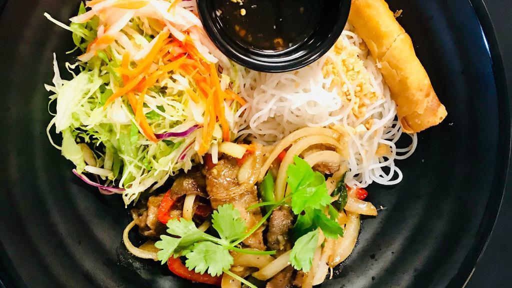 B 4 - Bún Bò Xào - Sauteed Beef · Stir-fried beef with red bell peer, onion over vermicelli noodle and an egg roll
