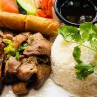 Com Thịt Nướng/ Grilled Pork · Rice dish with marinated charbroiled pork and egg roll