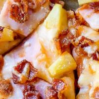 Hawaiian Specialty Pizza - 10'' - Small · Romio’s signature red sauce with canadian bacon, then topped with mozzarella cheese and pine...
