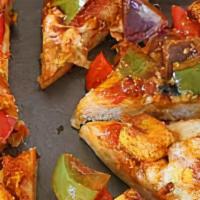 Paneer Veggie Pizza - 15'' - Large · Pizza sauce, onions, green peppers, tomatoes and mozzarella, Indian paneer cheese marinated ...