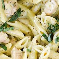 Pesto Chicken Penne · Penne in alfredo and pesto sauce, and grilled chicken