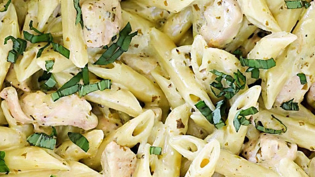 Pesto Chicken Penne · Penne in alfredo and pesto sauce, and grilled chicken
