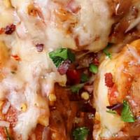 Baked Formaggi · Layer of meatballs on top of alfredo sauce, then smothered with mozzarella, parmesan, and fe...