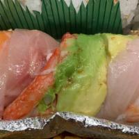 Rainbow Roll · california roll w/ tuna, salmon, yellow tail, white fish, and shrimp