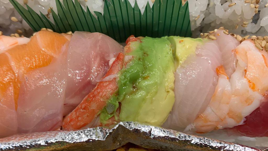 Rainbow Roll · california roll w/ tuna, salmon, yellow tail, white fish, and shrimp