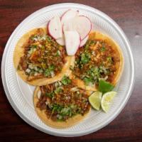 Tacos · Meat, cilantro, onions, salsa.