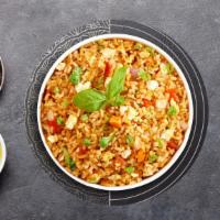 Thai Fried Rice · Jasmine rice, egg, onions, tomatoes, and green onions.