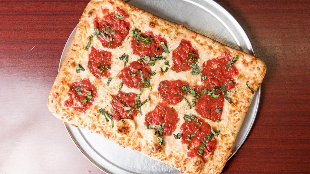 Grandma · Imported tomatoes, mozzarella cheese, topped with fresh basil.