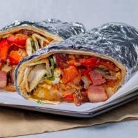 Corned Beef Burrito · Home made corned beef, tater tots, bell peppers, onions, Chinese sausage country gravy, frie...