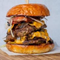 Double Smashed Bacon Burger · Double smashed patties, Korean pepper ketchup, white onion, sweet and spicy pickles, homemad...
