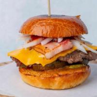 The Slide (Slider Size) · Single smashed patty, homemade bacon, . Korean ketchup, sweet mustard, raw white onion, swee...