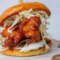 Korean Spicy Fried Chicken · Korean spice, sweet and spicy pickles, onion, cabbage, spicy Asian ranch dressing, brioche b...