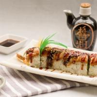 Dragon Roll · Shrimp tempura roll topped with fresh water eel, and sesame seed sweet unagi sauce.