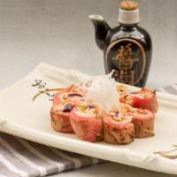 Rose Roll · Spicy. Spicy tuna, avocado roll topped with seared tuna with spicy mayo and sweet unagi sauc...
