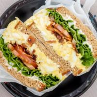 Sacks Dali (Half) · Homemade egg salad, country bacon, leaf lettuce, tomato, cream cheese, mayo, on 12 grain bre...