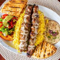 Kofta Kabab Plate · Ground beef mixed with onions, parsley, cilantro, and special spices. Served with hummus, ri...