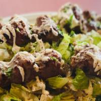 Kofta Kabab Salad · Ground beef mixed with onions, parsley, cilantro, and special spices. Served with lettuce, t...