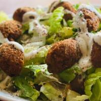 Falafel Salad · Crushed garbanzo beans mixed with parsley, cilantro, and spices. Lettuce, tomatoes, cucumber...