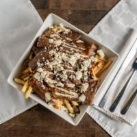 Gyro Fries · Fries topped with juicy gyro meat and our signature garlic-mayo sauce.