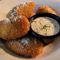 Mac And Cheese Bites · 6 Mac and cheese wedges  filled with macaroni noodle. Mozzarella and parmesan cheese served ...