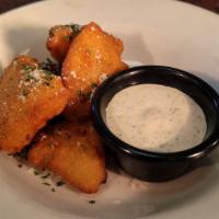 Jalapeno Poppers · 6 cream cheese poppers served with ranch.