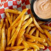 Large French Fry · SEASONED FRIES SERVED WITH A SIDE OF HOMEMADE AIOLI.
