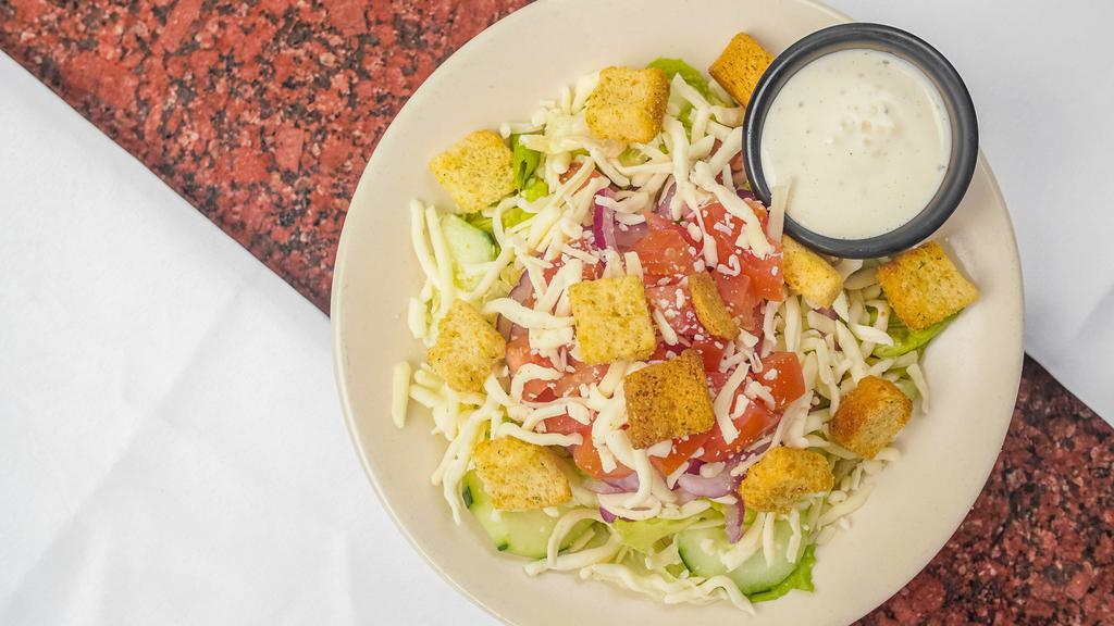House Salad · Lettuce mix, tomato, onions, cucumbers, mozzarella cheese, and croutons served with your choice of dressing