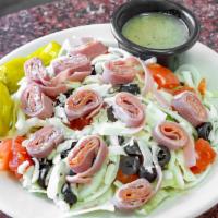 Antipasto Salad · Lettuce, Tomato, Onion, Pepperoncino, Olives, Salami, Ham, Pepperoni, Choice of Dressing