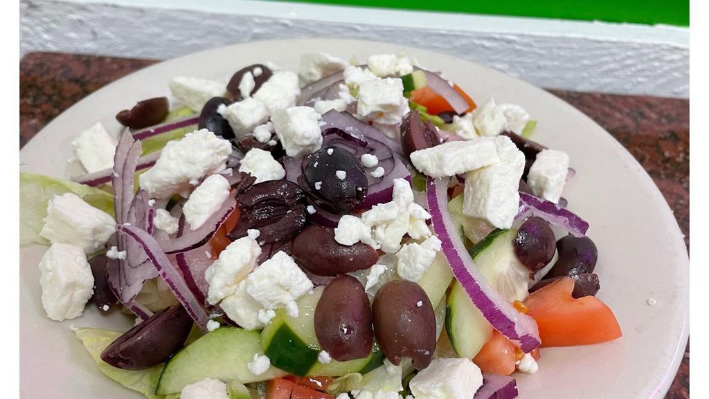 Greek Salad · Lettuce, Tomato, Cucumber, Kalamata Olives, Red Onion, & Feta Cheese