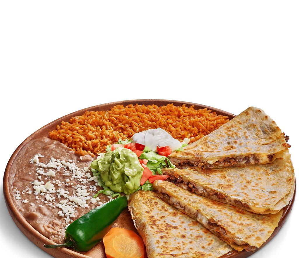 Quesadilla Plate · Flour tortilla stuffed with cheese and meat. Served with sour cream, guacamole, rice, beans on the side.