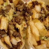 California Burrito · French fries, steak, cheese, pico, guacamole.
