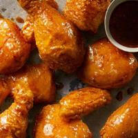 Soy Garlic Wings · A savory soy based sauce with a mild tang of garlic.