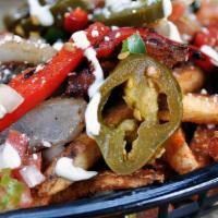 Down And Dirty Fries · Vegan, Gluten Free. Large fry loaded with sauteed fajita veg, creamy queso cheese sauce, and...