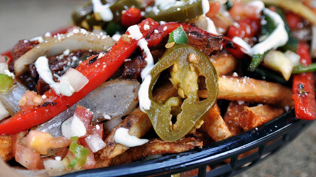 Down And Dirty Fries · Vegan, Gluten Free. Large fry loaded with sauteed fajita veg, creamy queso cheese sauce, and mexican white cheese, crema, jalapeno, pico, and Tex Sauce.