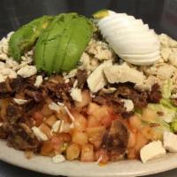 Cobb Salad · Romaine with blue cheese crumbles, chicken, egg, tomato, olives and bacon, served with your ...