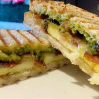 Good Morning Pesto Sandwich · Sourdough bread, eggs, Monterey jack cheese, pesto, mayo, and bacon.
