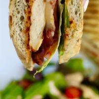 Chipotle Focaccia · Grilled chicken breast, bacon, Monterey jack cheese, romaine lettuce, tomato, almond based c...
