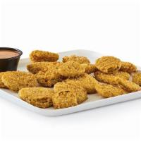 Fried Pickle Nickles · Golden-fried dill slices served with Campfire Mayo.