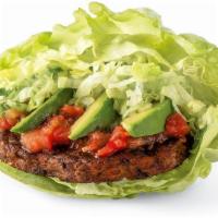 Vegan Burger · (320 cal.) Our custom-blended, ancient-grain-and-quinoa veggie patty is piled high with Swis...