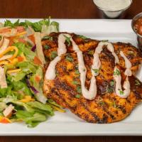 Ensenada Chicken Platter · Two fire grilled chicken breasts basted with authentic Mexican seasonings, topped with fresh...