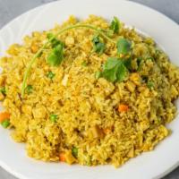 Curry Fried Rice · White rice, Indian spice seasoning, peas, carrots, garlic, cubed fried tofu, cubed soy ham, ...