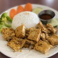Lemongrass Tofu-Spicy · Fried tofu sautéed in lemongrass, garlic, red pepper flakes, with a side of fresh cucumber, ...